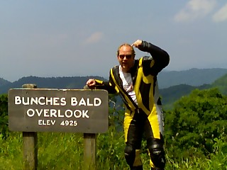 [06/29/06: Terry showing his balding head at the Bunches Bald overlook off the Blue Ridge Parkway near Waynesville, NC.]