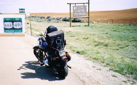 [The picture of me going into Colorado and the road sign showing that this was also old Highway 666.]