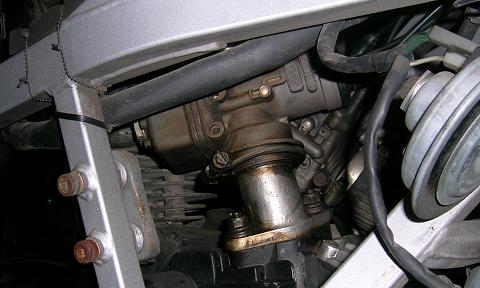 [There's absolutely no way that this carb is mounted correctly!]