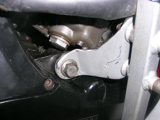 [The engine mount notched to allow the horizontal carb to sit more level.]