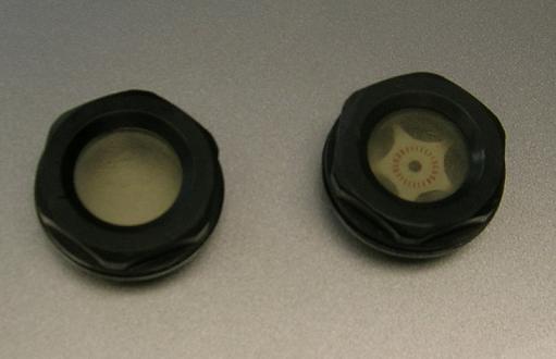 [Both sight glasses from the 650 Pantah engine that I bought from a guy on eBay.]